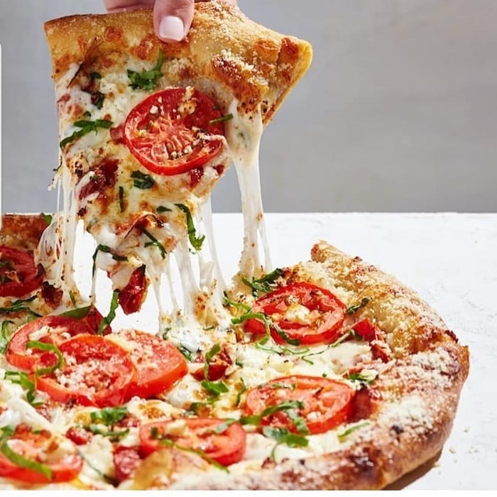 Does feta melt on pizza?